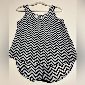 Sleeveless, black and white, women’s shirt